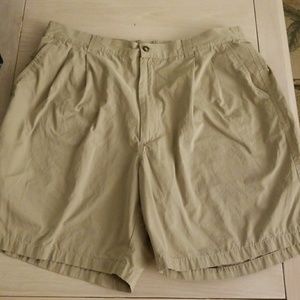 Greg Norman khaki Shorts. Size 38.